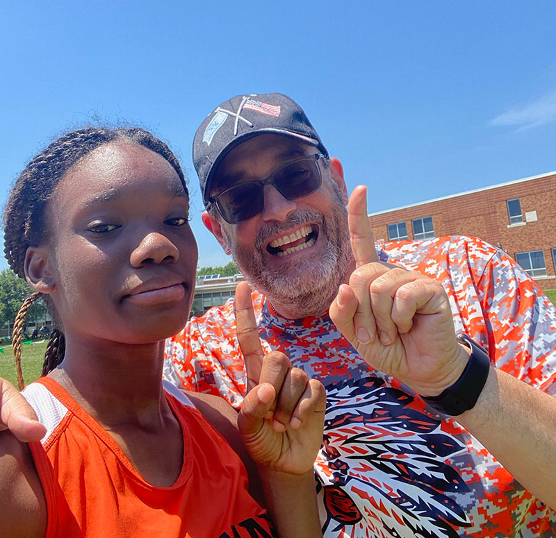 Holland Henderson pictured with Coach Matthew Swartz