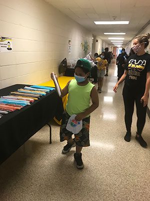 students prep for lunch - summer 2020