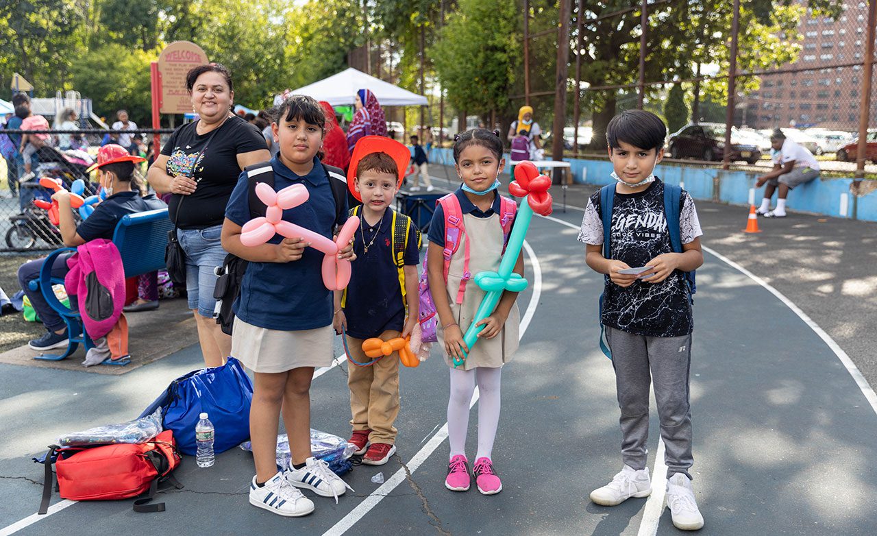 Students display their balloon sculptures created at the Resource Fair!