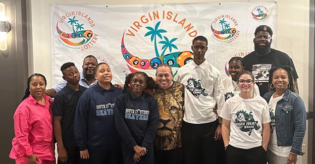 Students of South 17th Street and West Side High Schools along Principals Allen & Cook, Superintendent Leὀn, and staff