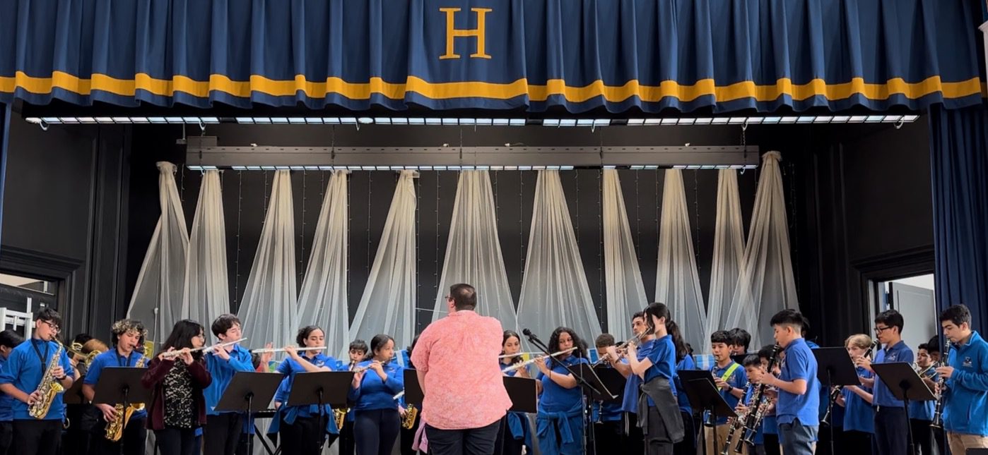 Middle school students from Hawkins Street School perform Jingle Bells